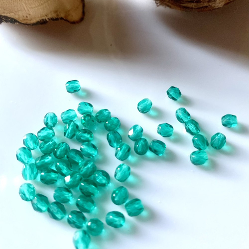 50 perles olives facettées en cristal turquoise 4mm