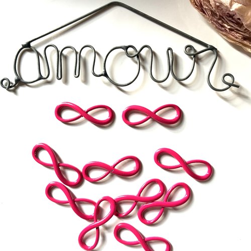 Pendentifs connecteurs infini en métal fuchsia x2