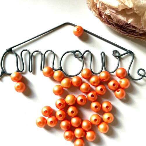 38  perles synthétiques orange 7mm