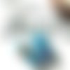 4 perles en verre en bleu et turquoise à motifs