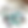 Lot de 14 perles en verre bleues et blanches