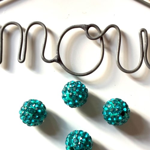 Deux perles rondes facettées en cristal turquoise