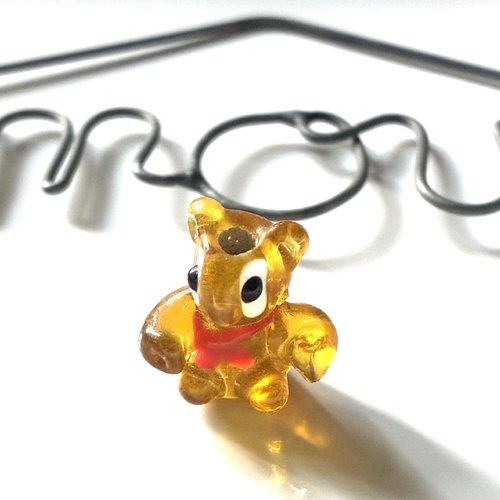 Perle ourson en verre doré