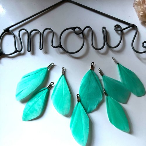 Plume en turquoise avec accroche métal argenté petit modèle 3,5cm