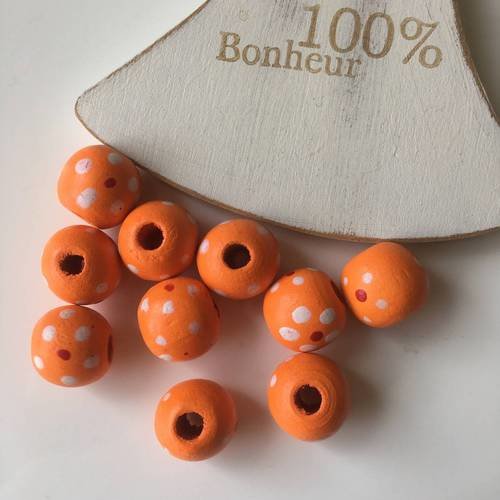 Lot de 10 perles rondes en bois orange à pois 