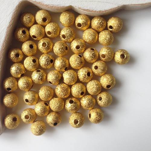 Lot de 50 perles rondes métal effet pailletées dorées 