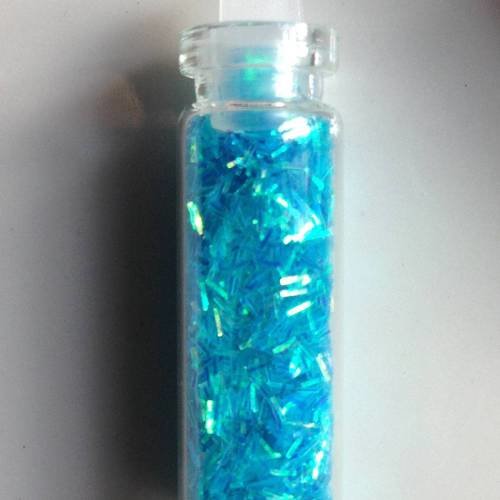 Fiole en verre 3cm avec des micropaillettes en turquoise 