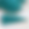 Pompon fils de soie synthétiques turquoise dimension 10cm 