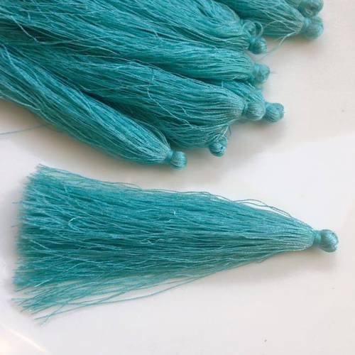 Pompon fils de soie synthétiques turquoise dimension 10cm 