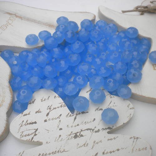Lot de 10 perles toupies facettées en cristal bleu 
