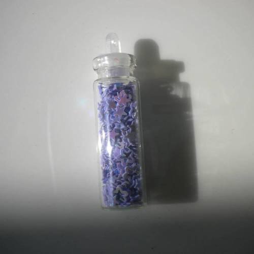Fiole en verre 3cm avec des micropaillettes étoiles en mauve 