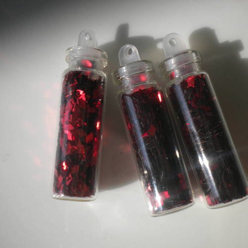 Fiole en verre 3cm avec des micropaillettes losanges en rouge 