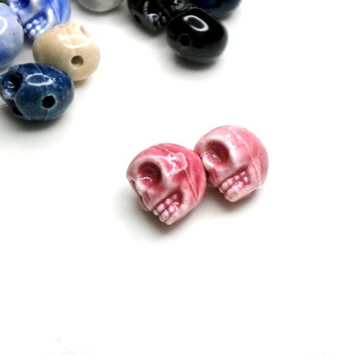 Lot de perles porcelaine en rose crâne tête de mort x2