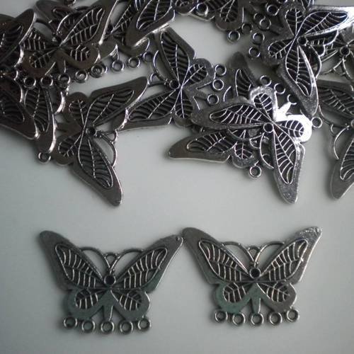2 pendentifs papillons en métal argenté 5 piquots