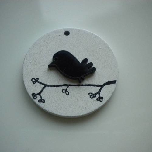 Pendentif rond en bois oiseau en noir et blanc