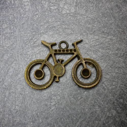 Breloque bicyclette en bronze 36x23 mm