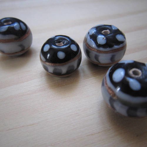 Perles rondes en verre noir et blanc, lignes cuivrées - lot de 2