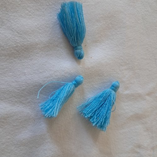 Pompons en coton bleu moyen