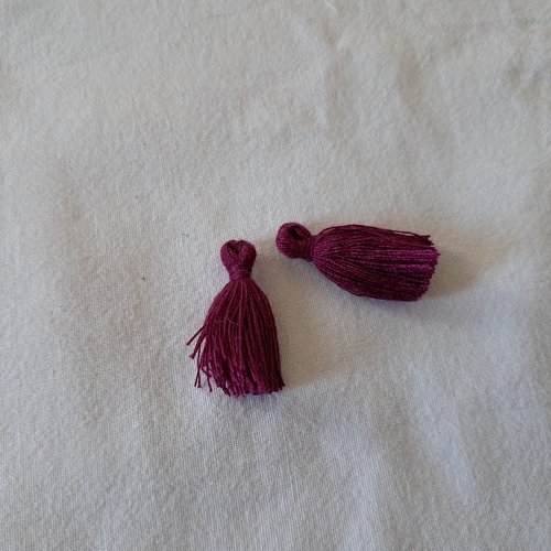 Pompons en coton violet prune