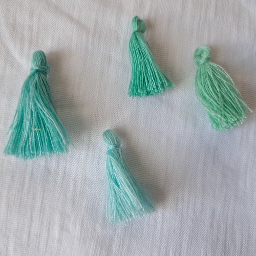 Pompons en coton turquoise - lot de 4