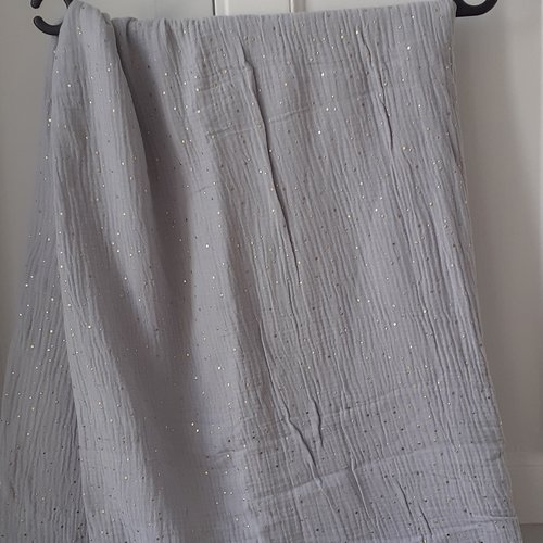 Coupon de double gaze gris clair à motifs de pois dorés