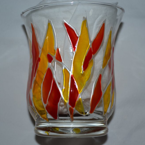 Photophore forme tulipe en verre peint graphique orange, jaune et rouge