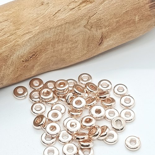 Lot de 50 perles donuts en acrylique doré clair 6mm