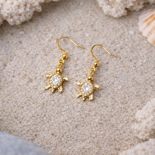 Boucles d’oreilles tortue dorées – bijou marin élégant