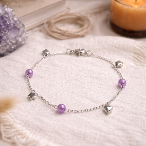 Bracelet fait main – perles violettes & breloques