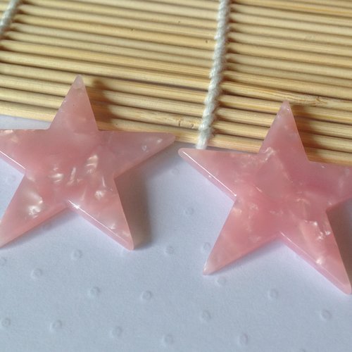2 pendentifs étoiles en acétate rose