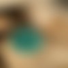 Pendentif vert nacré en bois résiné