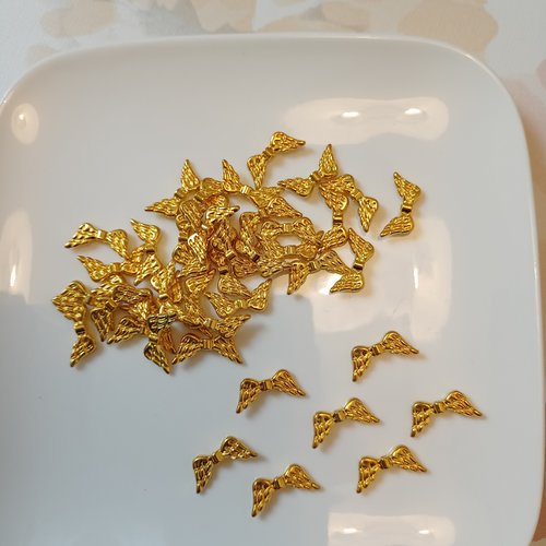 Lot de 42 perles ailes en métal doré  17 x 5 mm