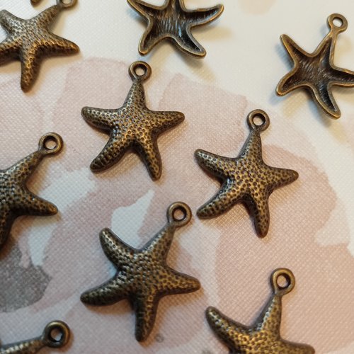 13 breloques étoile de mer 23 x 19 mm en métal couleur bronze