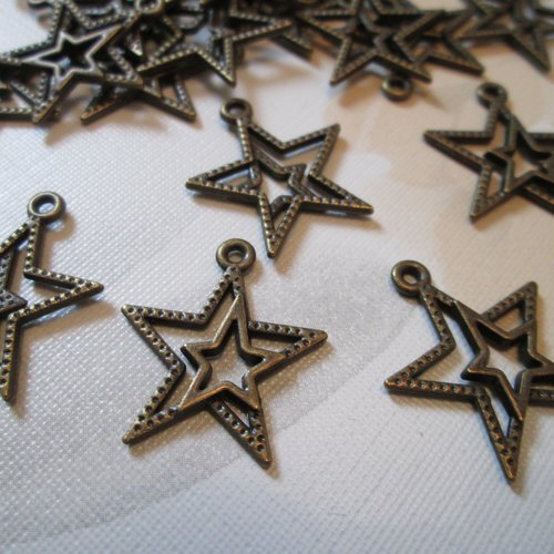 27 breloque étoile en métal couleur bronze 23 x 20 mm