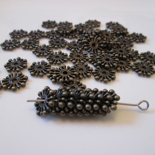 10 perles rondelle étoilée 10 mm métal couleur bronze