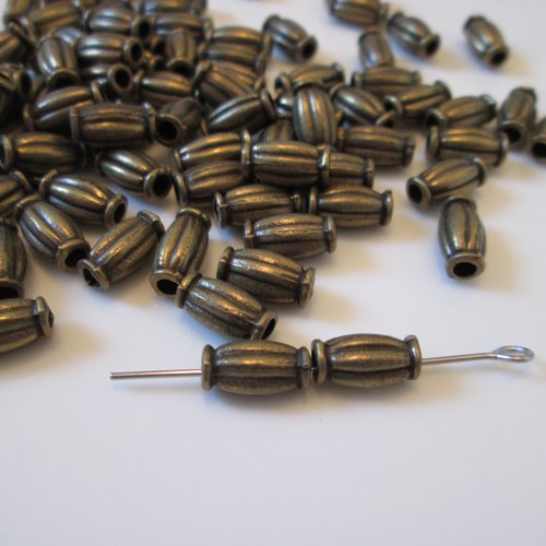 10 perles tube 9 mm métal couleur bronze