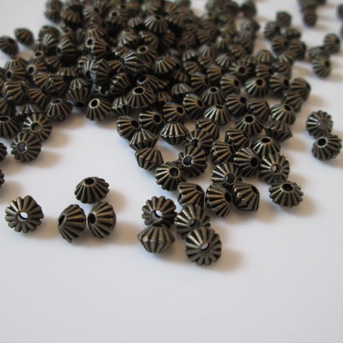 10 perles bicône 5 mm métal couleur bronze