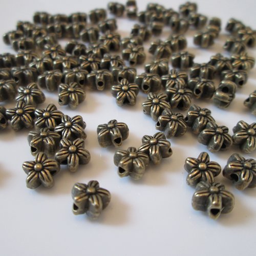 10 perles fleur 7 mm métal couleur bronze