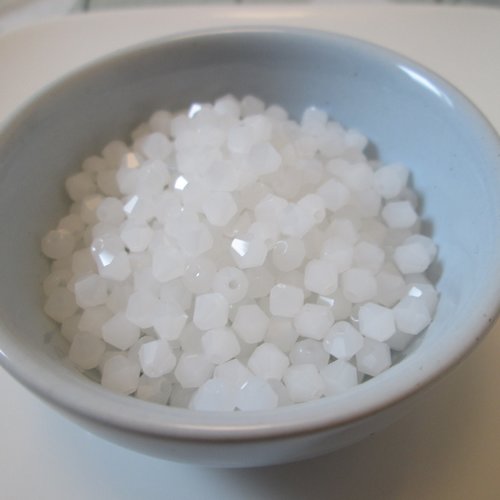 10 perles bicone facettes 4 mm en verre blanc