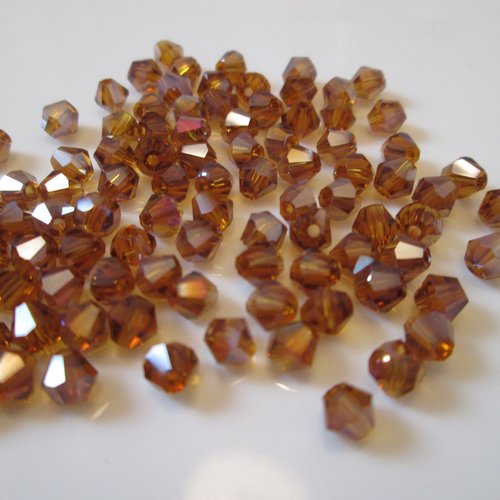 10 perles bicone facettes 4mm en verre ambre