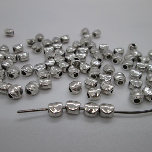 10 perles palet irrégulier en métal argenté 5mm