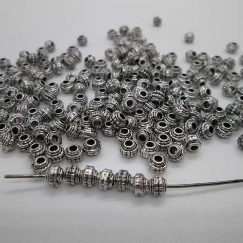 10 perles toupie tonneau en métal argenté 5 mm