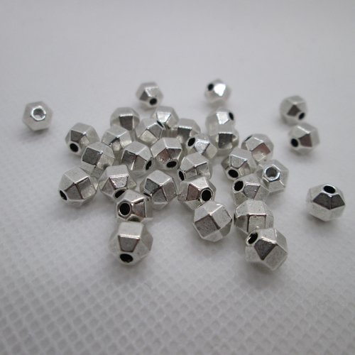 10 perles olive facette en métal argenté 6 mm