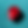 1 grosse perle ovale en acrylique rouge foncé tacheté noir 25x18mm