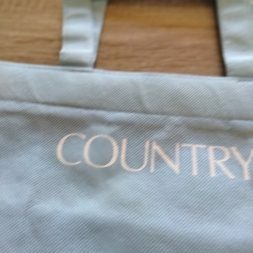 Sac cadeau bleu ciel tissu propylène avec inscription country