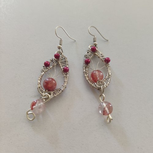 Boucles d'oreilles pierre de lave orange enserrée dans fils métal argent