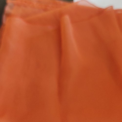 Voilage polyester couleur rouille