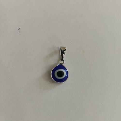 Breloques pendentifs mauvais oeil plaqué argent et résine