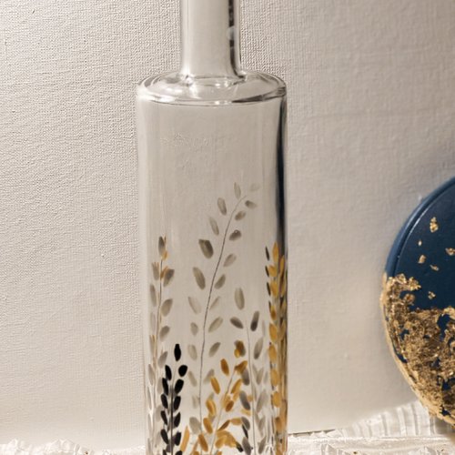 Bouteille en verre peinte motif feuillage or argent et noir  photophore de noël   décoration de noël