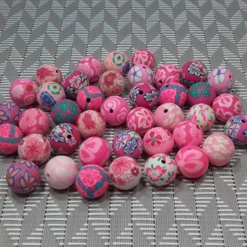 X 40 perles fimo rondes fleuries en pâte polymère +/- 12mm. coloris rose. fleurs